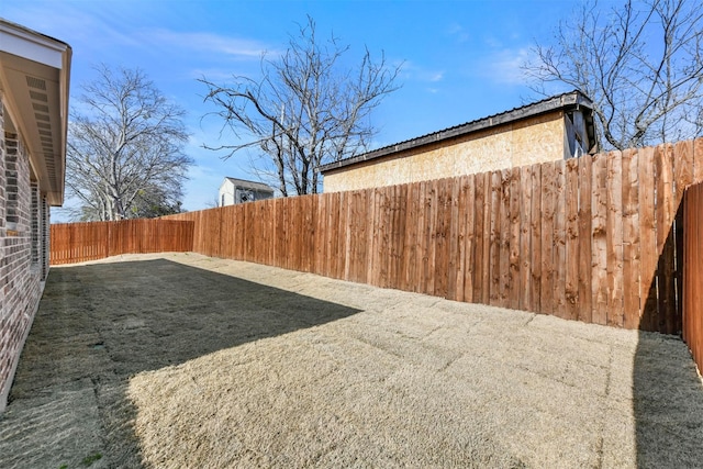 view of yard featuring a fenced backyard