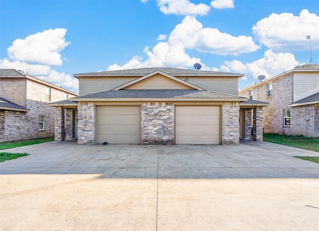 front of property with a garage