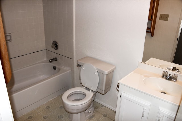 full bathroom featuring bathtub / shower combination, vanity, and toilet