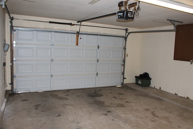 garage featuring a garage door opener