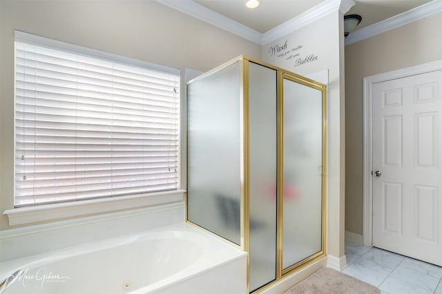 bathroom with ornamental molding and separate shower and tub