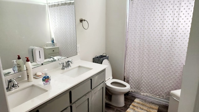 full bathroom featuring shower / bath combination with curtain, vanity, wood-type flooring, and toilet