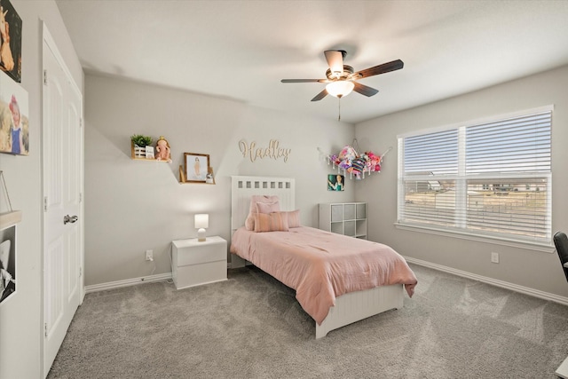 carpeted bedroom featuring ceiling fan