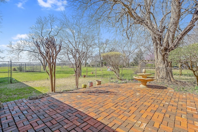 view of patio / terrace featuring a gate and fence