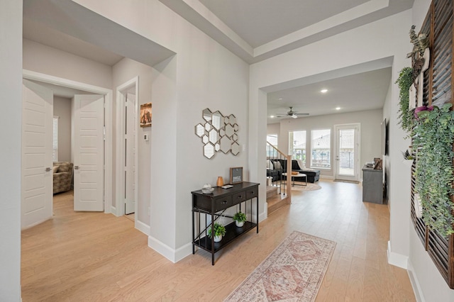 corridor featuring light hardwood / wood-style flooring