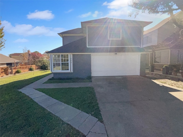 front facade featuring a garage and a front yard