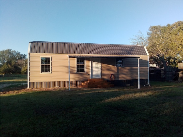 exterior space with a lawn