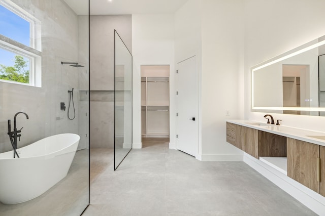 bathroom with vanity, plus walk in shower, and concrete flooring