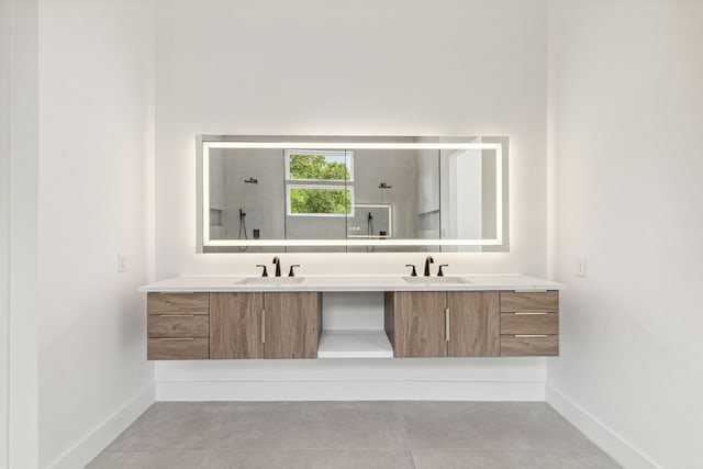 bathroom featuring a shower and vanity