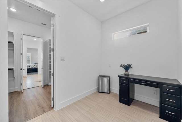 office area featuring recessed lighting and baseboards