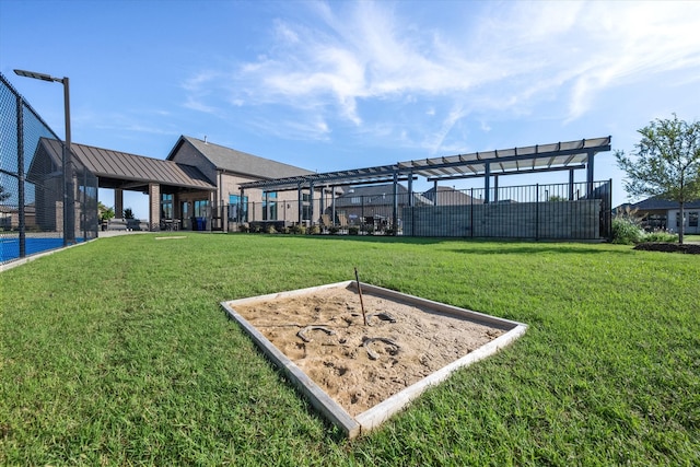 view of community featuring a lawn