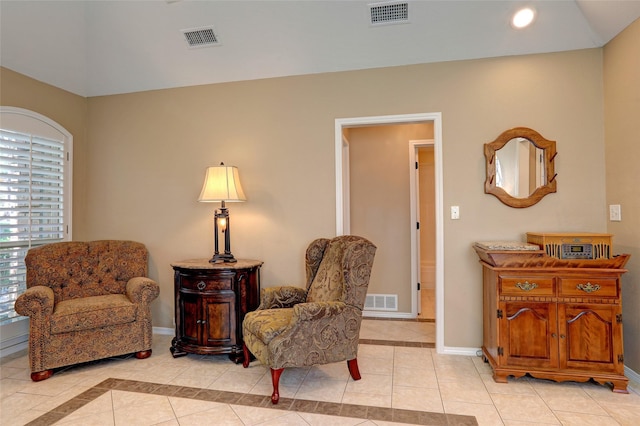 sitting room featuring light tile patterned floors