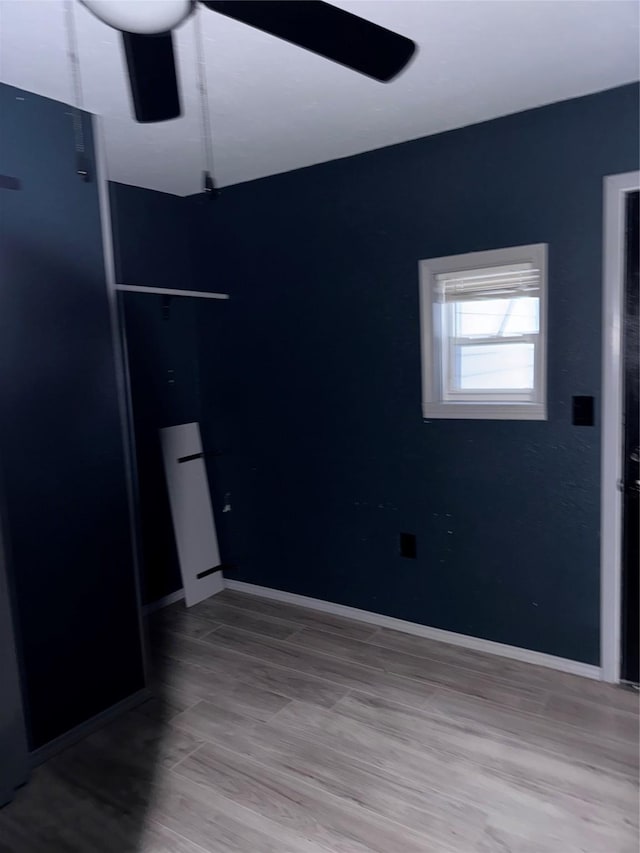 empty room with hardwood / wood-style floors