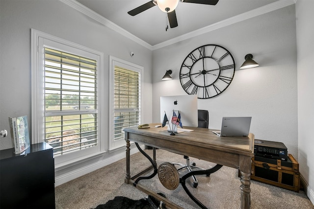 carpeted home office featuring a wealth of natural light, crown molding, and ceiling fan