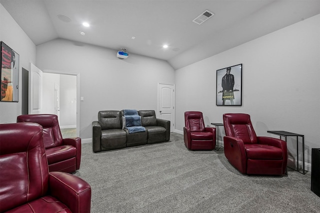 carpeted cinema with vaulted ceiling