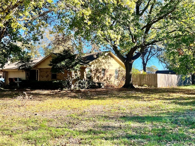 view of property exterior featuring a yard