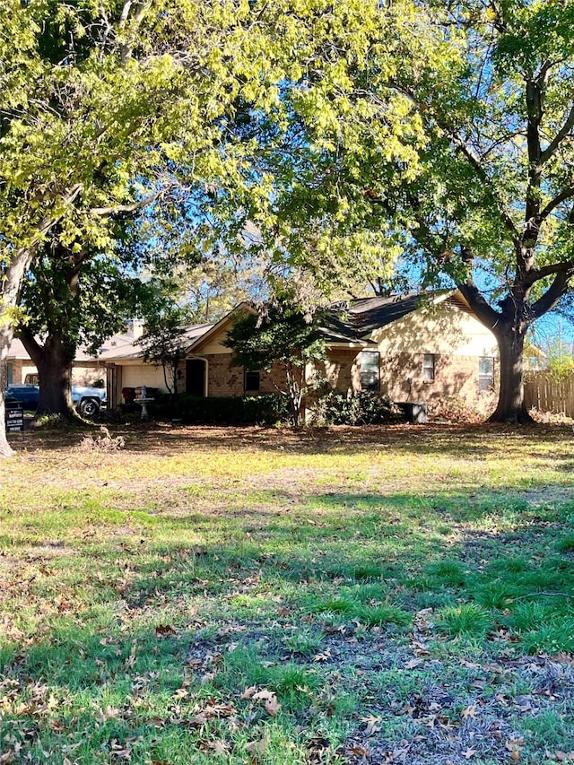 exterior space with a front yard