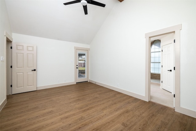 interior space featuring hardwood / wood-style flooring, high vaulted ceiling, and ceiling fan