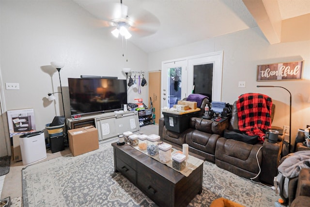 living room featuring french doors, ceiling fan, and lofted ceiling