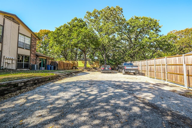 view of yard featuring central AC unit