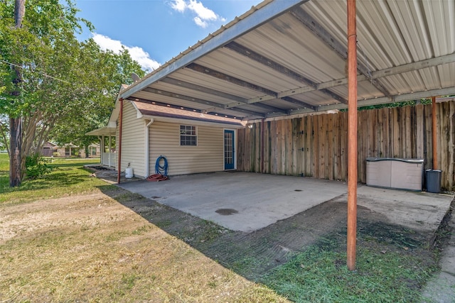 exterior space featuring a carport