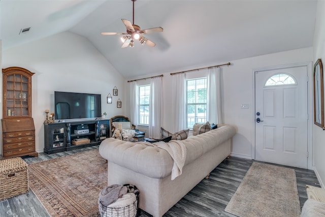 living room with lofted ceiling, dark wood-type flooring, and ceiling fan