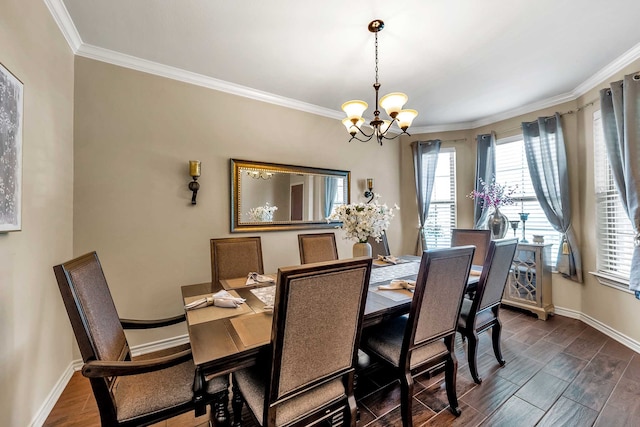 dining space featuring an inviting chandelier, ornamental molding, and dark hardwood / wood-style flooring