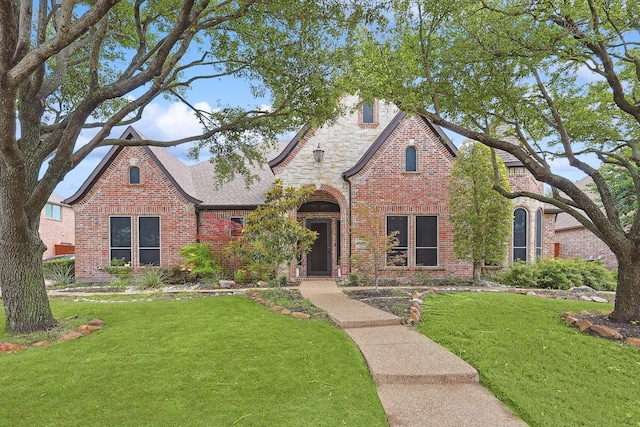 tudor house with a front lawn