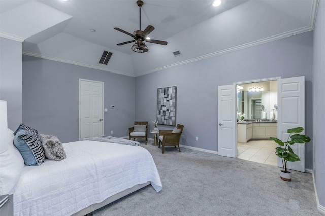 bedroom featuring ensuite bathroom, crown molding, vaulted ceiling, ceiling fan, and light colored carpet