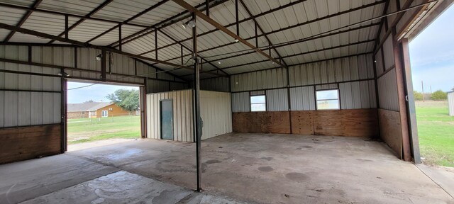 garage featuring a carport