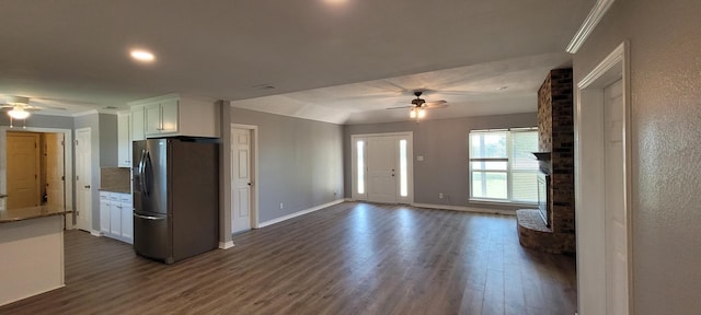 kitchen featuring ceiling fan, white cabinetry, stainless steel refrigerator with ice dispenser, and dark wood-type flooring