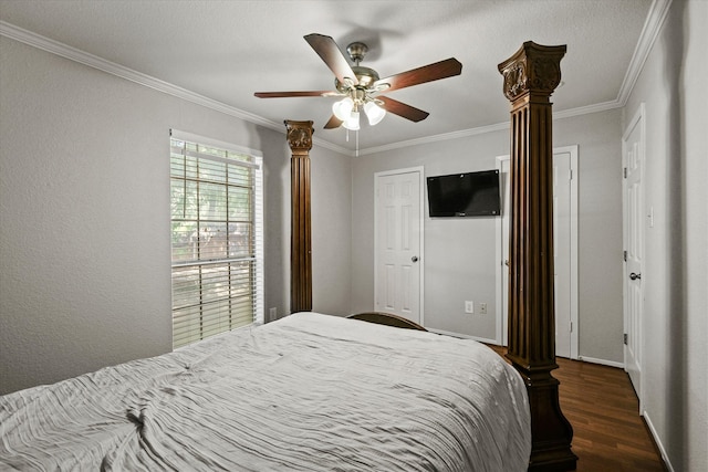 bedroom with ceiling fan, dark hardwood / wood-style floors, and crown molding