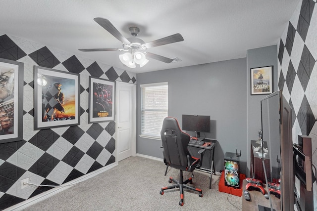 home office with ceiling fan and light carpet