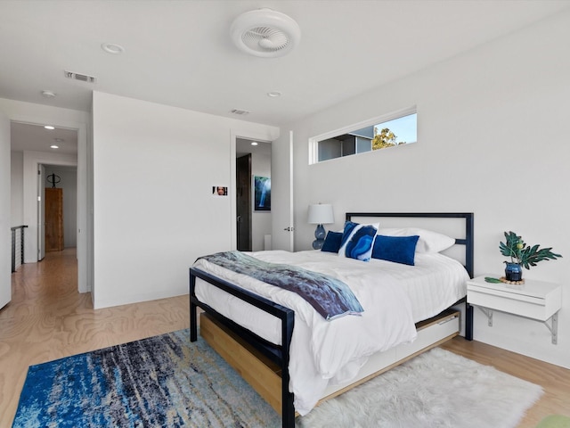 bedroom featuring hardwood / wood-style flooring