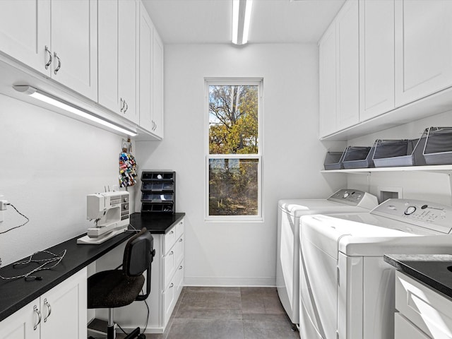 laundry area featuring cabinets and washing machine and dryer