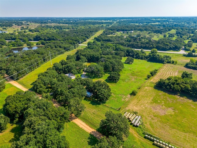 aerial view featuring a rural view and a water view