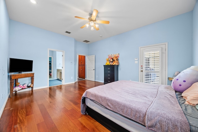 bedroom with ceiling fan and hardwood / wood-style floors