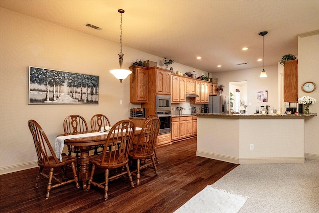 dining space featuring baseboards, dark wood finished floors, visible vents, and recessed lighting