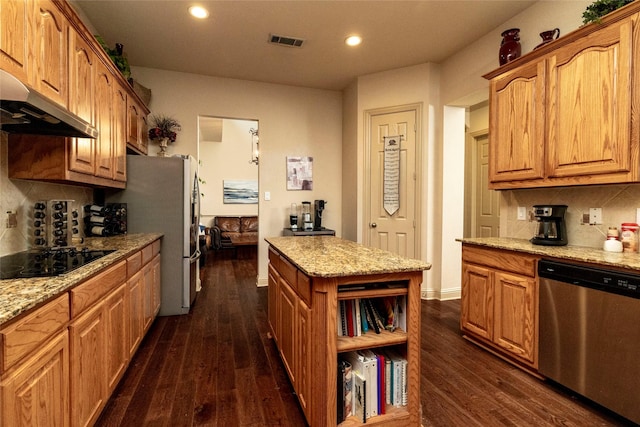 kitchen with dark hardwood / wood-style floors, black stovetop, dishwasher, backsplash, and light stone countertops