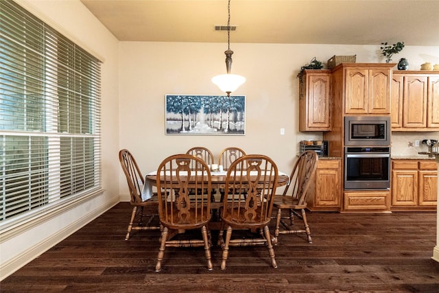 dining room featuring dark hardwood / wood-style floors