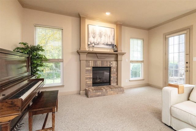 sitting room featuring ornamental molding, a brick fireplace, light colored carpet, and baseboards