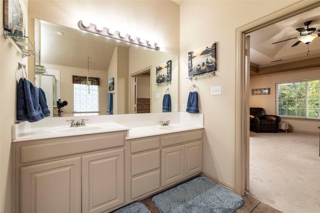 bathroom featuring vanity, a wealth of natural light, and ceiling fan