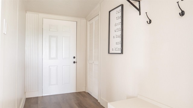 entryway with wood finished floors