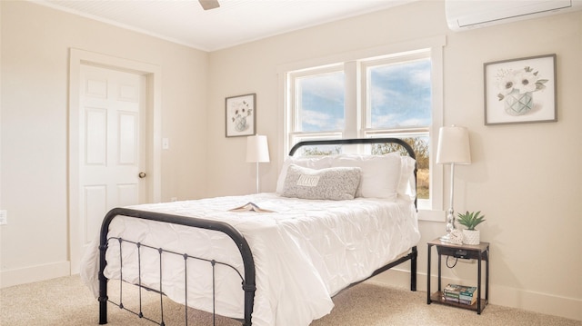 carpeted bedroom featuring a wall unit AC, baseboards, and a ceiling fan