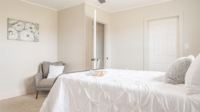 bedroom featuring ornamental molding, carpet, and baseboards