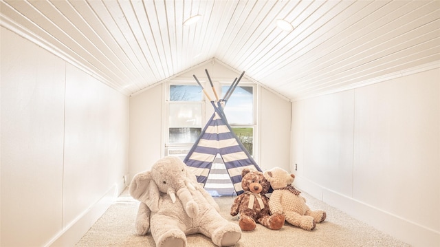 interior space featuring vaulted ceiling and wood ceiling