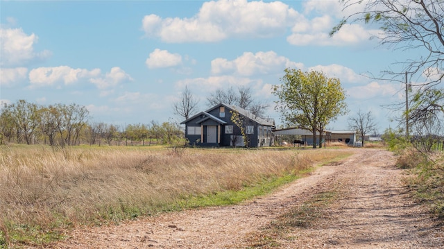 view of road with driveway