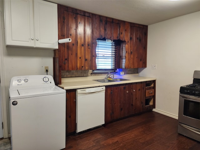 kitchen featuring dishwasher, sink, stainless steel range oven, dark hardwood / wood-style flooring, and washer / clothes dryer