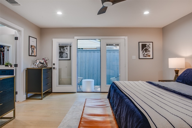 bedroom with access to exterior, ceiling fan, french doors, and light hardwood / wood-style floors