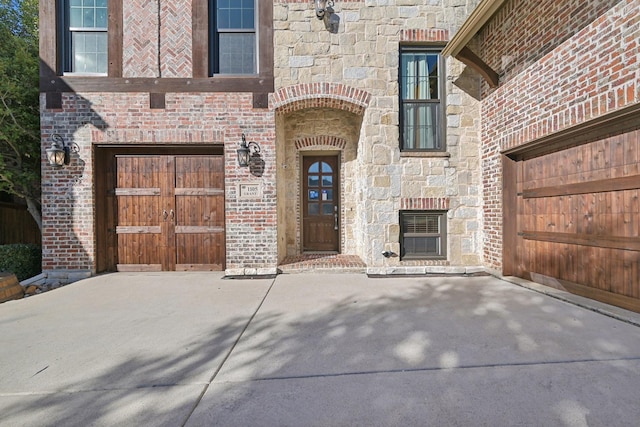 property entrance with a garage